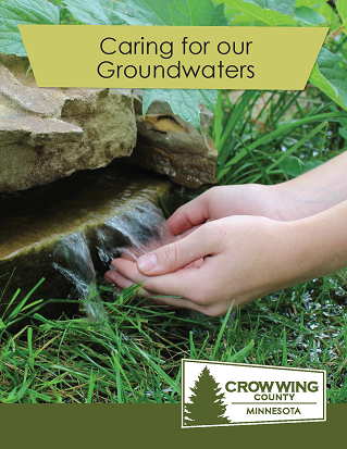 Brochure cover for caring for our groundwaters showing a person's cupped hands under a small wate