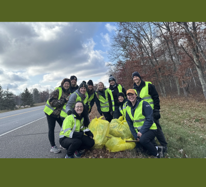Crosslake Vet Hospital volunteers with trash bags