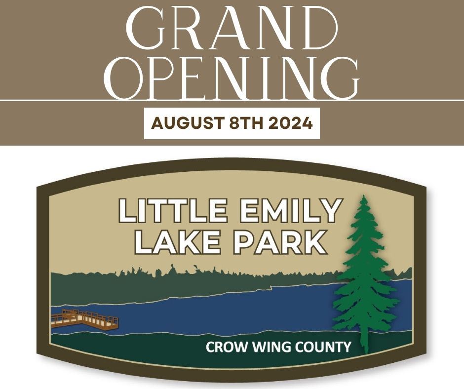 Illustrated badge of a lake with a doc and a pine tree.