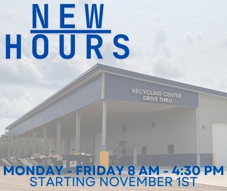 An Industrial building with a drive through overhang and the text 